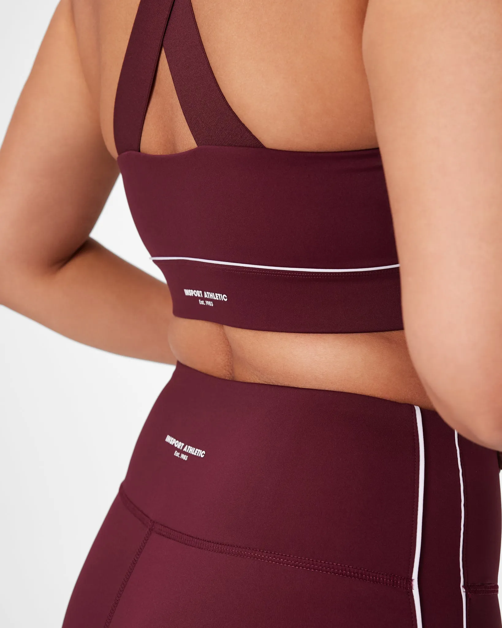 INSPORT WOMENS SWIFT PIPING BRA BURGUNDY